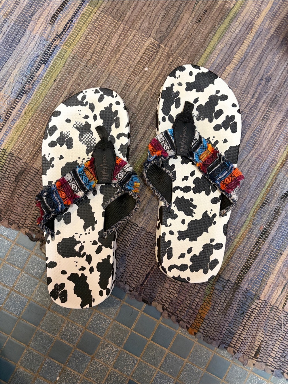 Gypsy Jazz Cow-Print Flip Flops with Multicolor Woven Straps